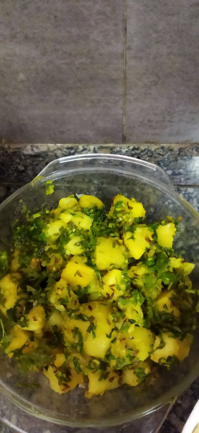 Delicious Jeera Aloo prepared by COOX