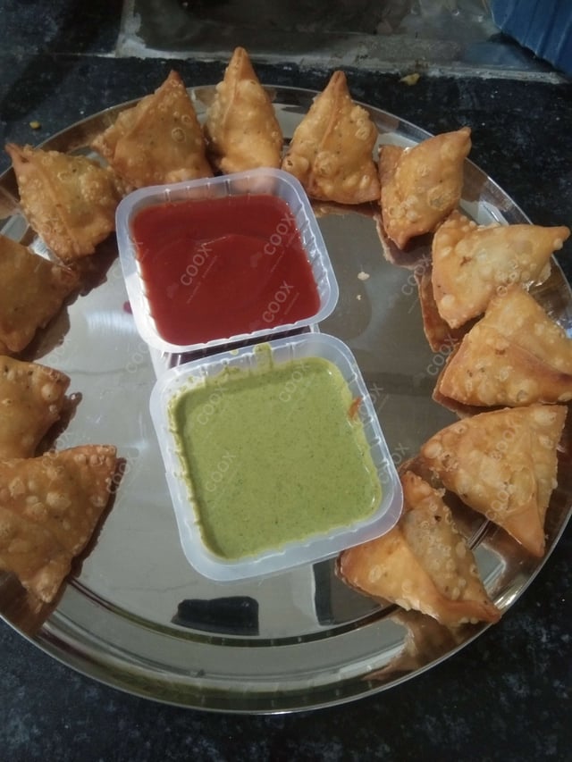 Delicious Mini Samosas prepared by COOX