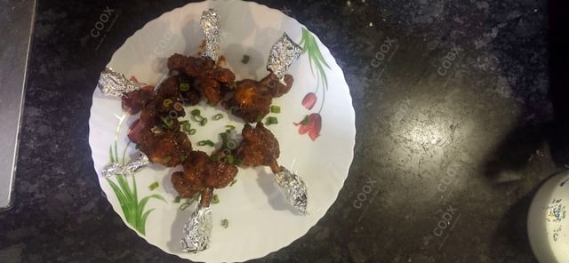 Delicious Chicken Lollipop prepared by COOX