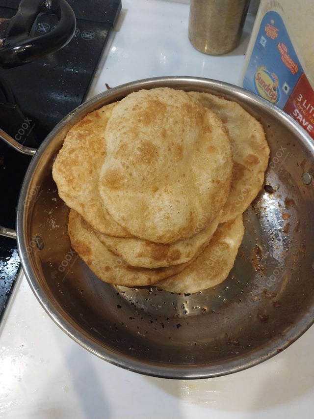 Delicious Bhature prepared by COOX