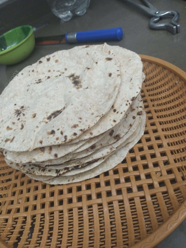 Delicious Tawa Rotis prepared by COOX