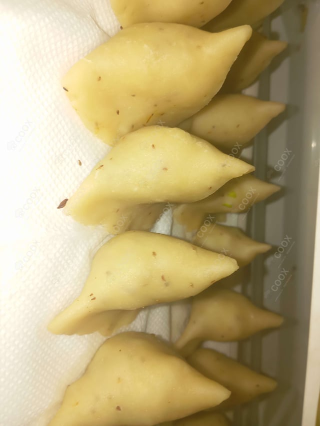 Delicious Mini Samosas prepared by COOX