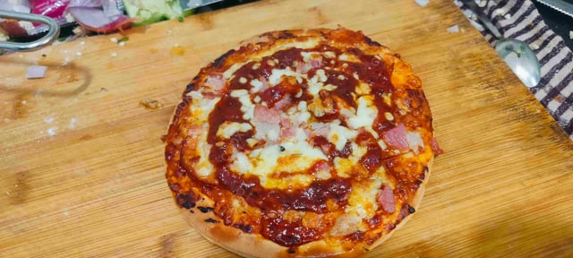 Delicious Pepperoni Pizza prepared by COOX