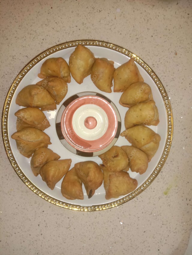 Delicious Mini Samosas prepared by COOX