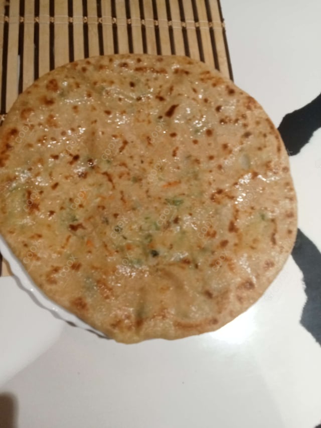 Delicious Stuffed Paranthas prepared by COOX