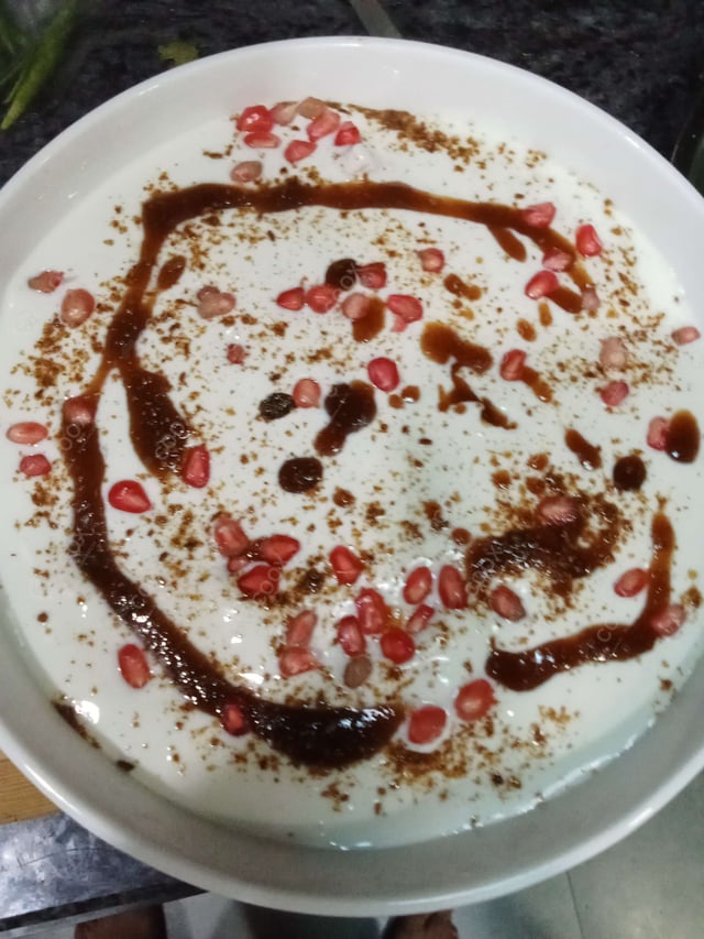 Delicious Dahi Bhalla prepared by COOX