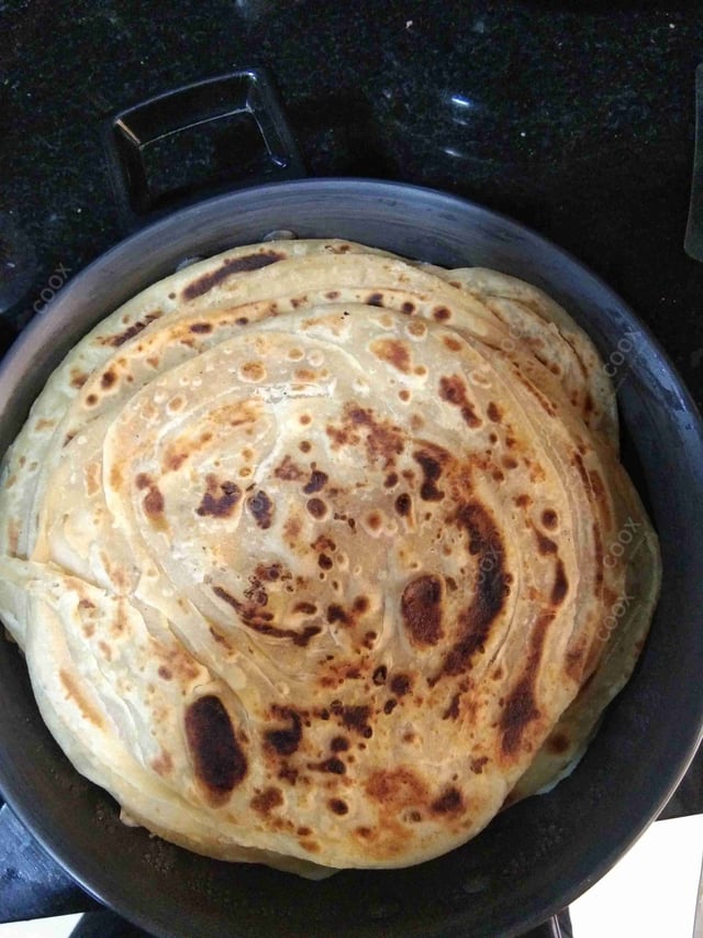 Delicious Lachha Paranthas prepared by COOX