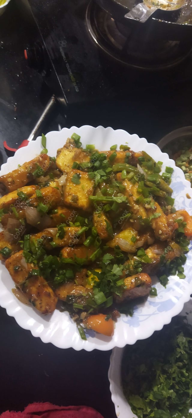 Delicious Chilli Paneer (Dry) prepared by COOX