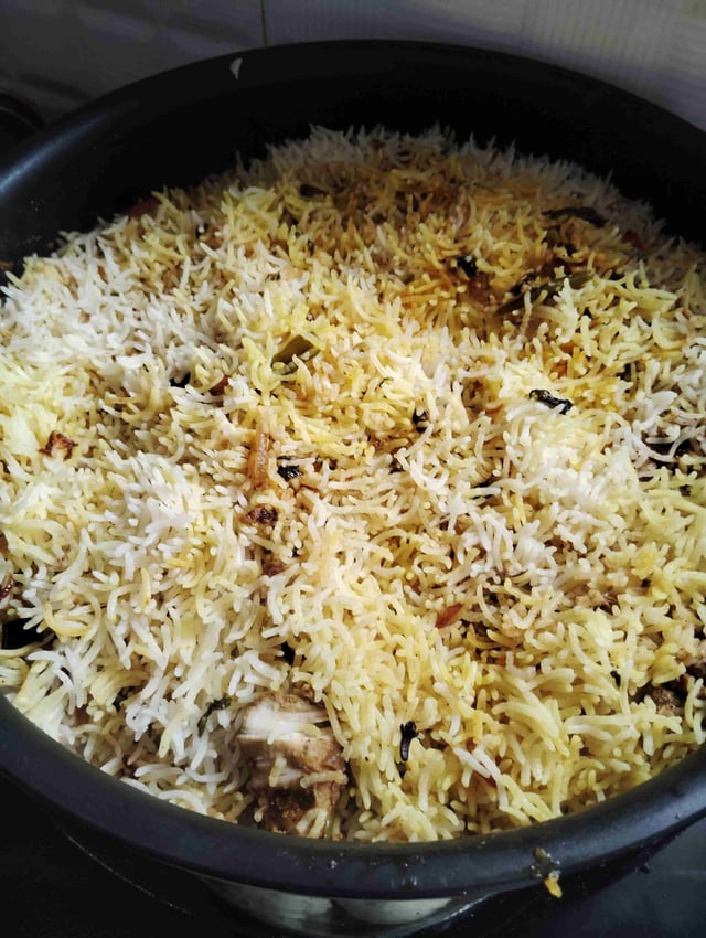 Delicious Chicken Biryani prepared by COOX