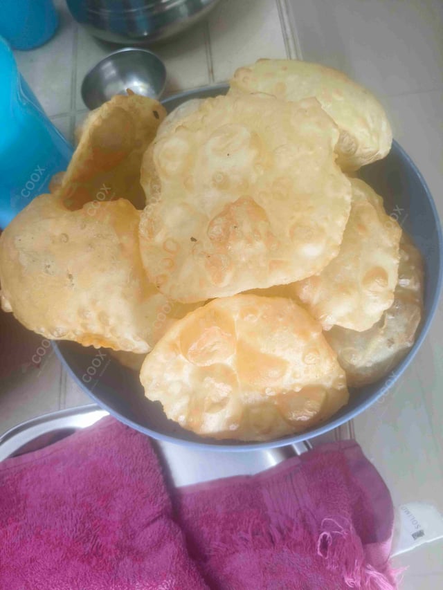 Delicious Chana Bhatura prepared by COOX