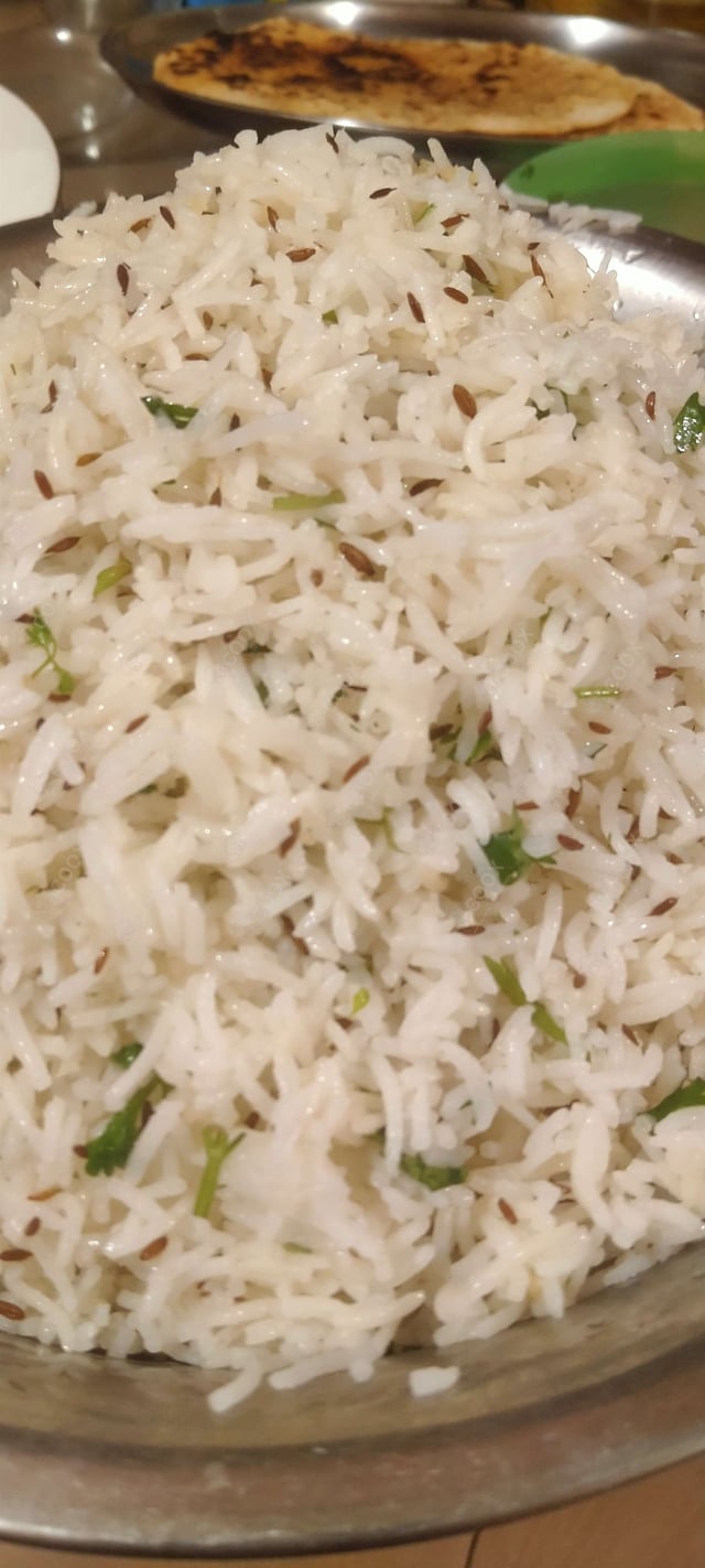 Delicious Jeera Rice prepared by COOX