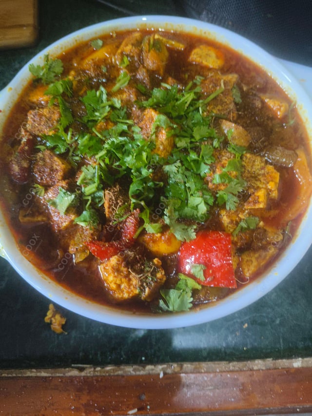 Delicious Kadhai Paneer prepared by COOX