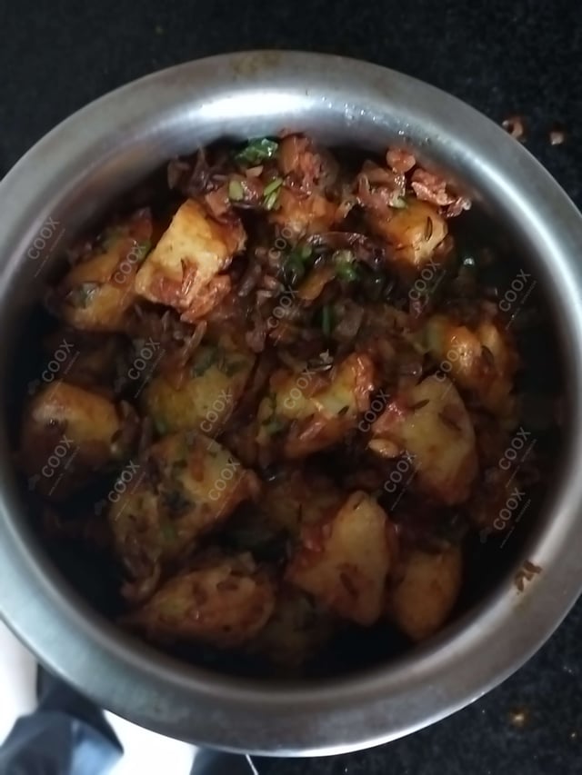 Delicious Jeera Aloo prepared by COOX