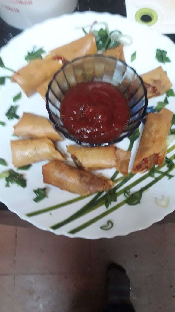 Delicious Veg Spring Rolls prepared by COOX