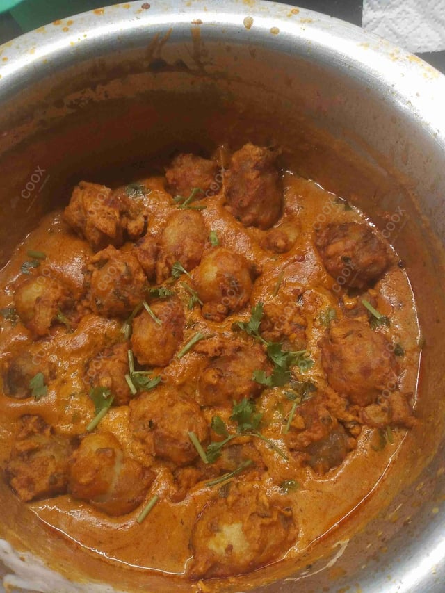 Delicious Dum Aloo prepared by COOX