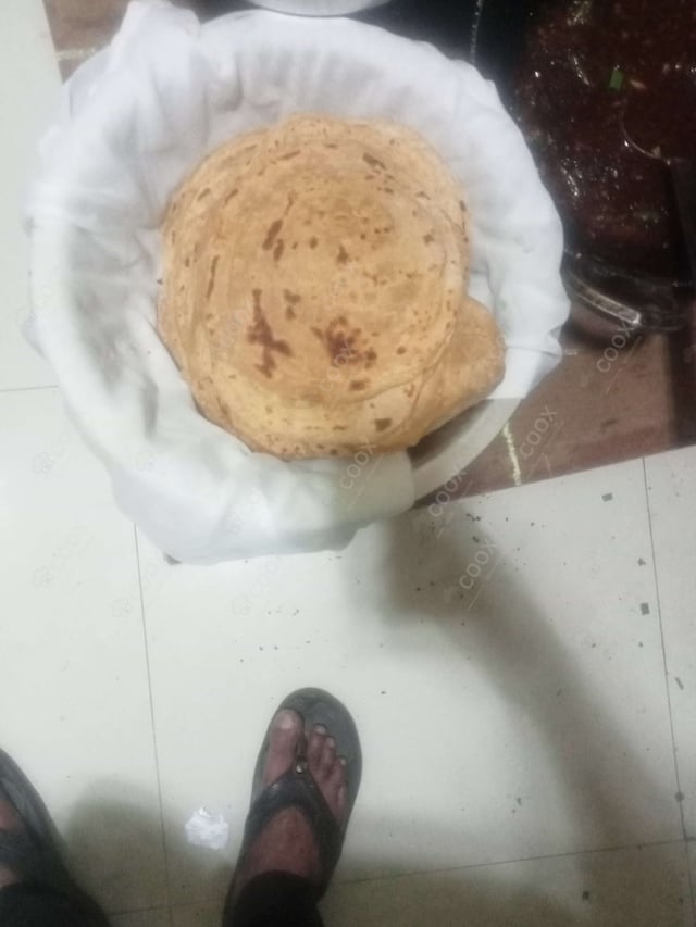 Delicious Lachha Parathas prepared by COOX