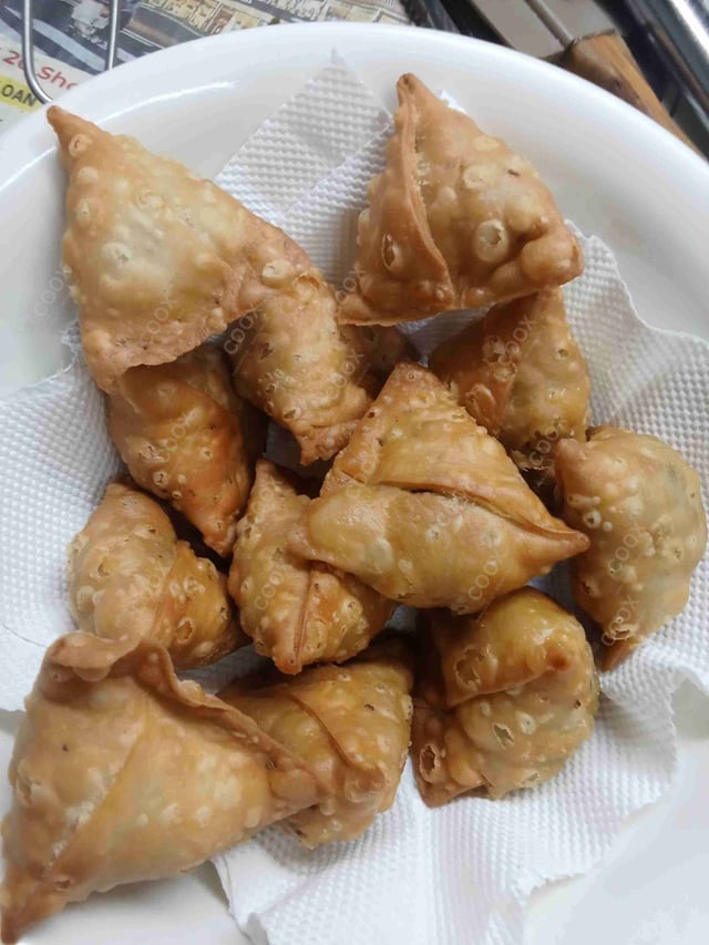 Delicious Mini Samosas prepared by COOX