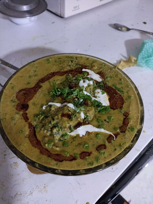 Delicious Methi Matar Malai prepared by COOX