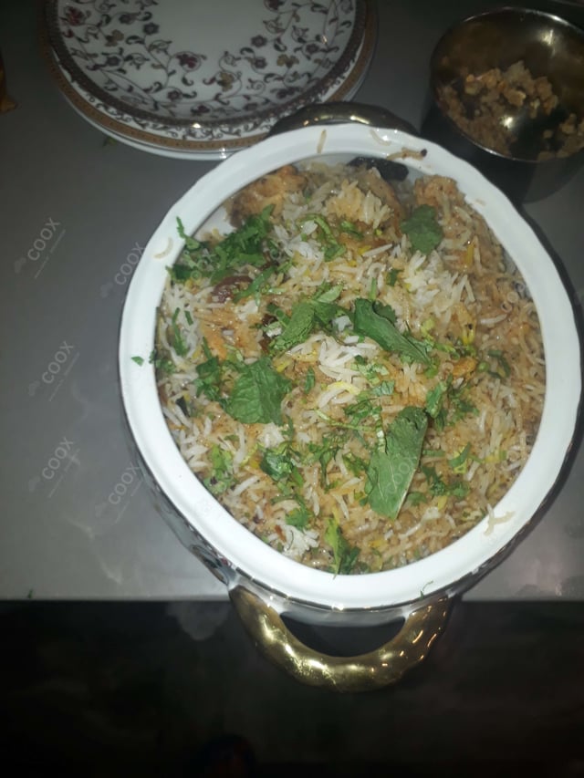 Delicious Chicken Biryani prepared by COOX