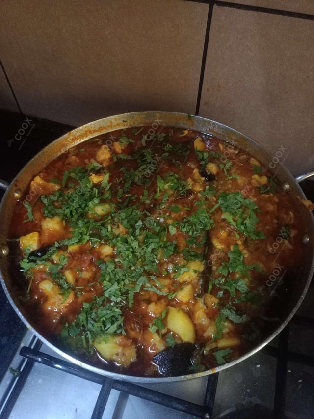 Delicious Aloo Gravy prepared by COOX