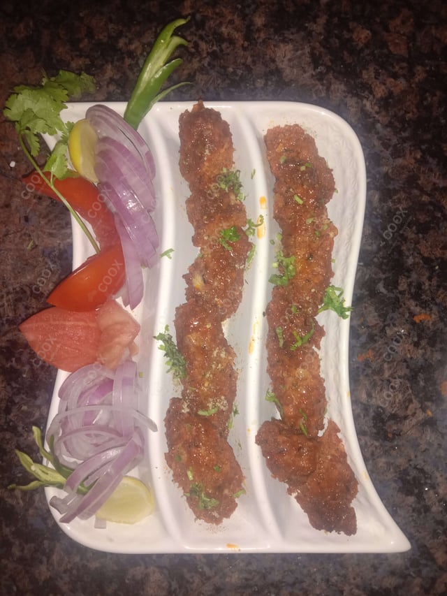 Delicious Mutton Seekh Kebab prepared by COOX