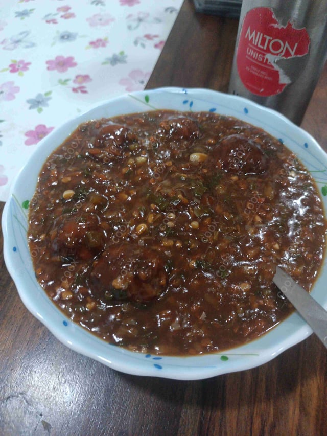 Delicious Veg Manchurian (Dry) prepared by COOX