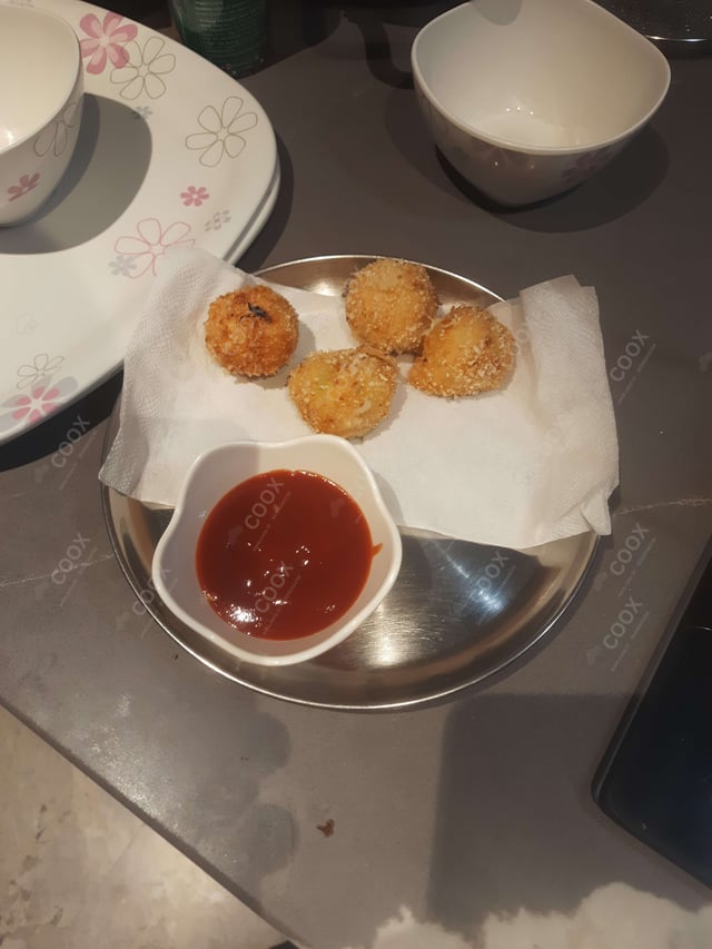 Delicious Fried Cheese Balls prepared by COOX