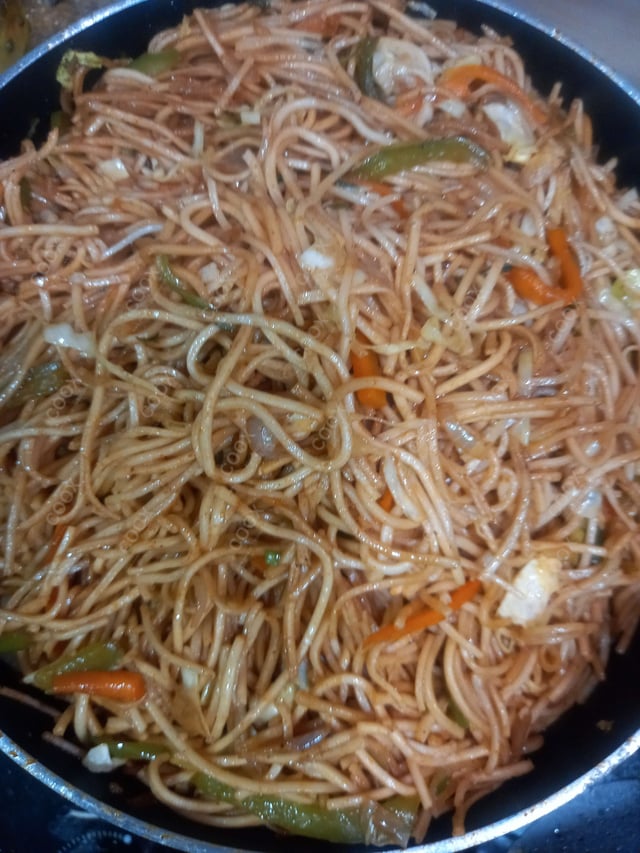 Delicious Veg Hakka Noodles prepared by COOX