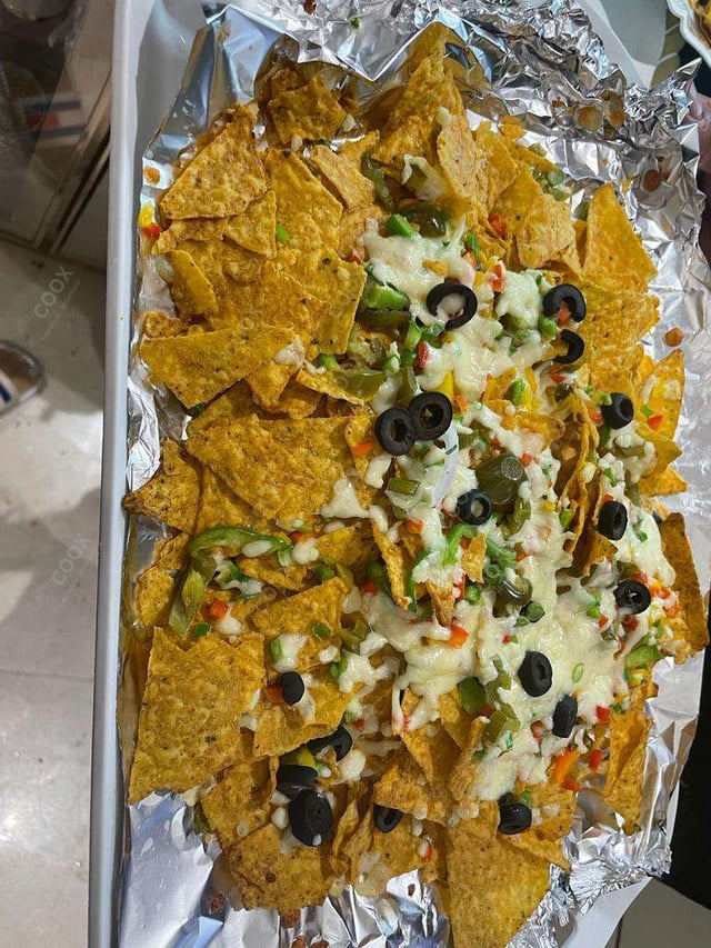 Delicious Cheese Nachos prepared by COOX