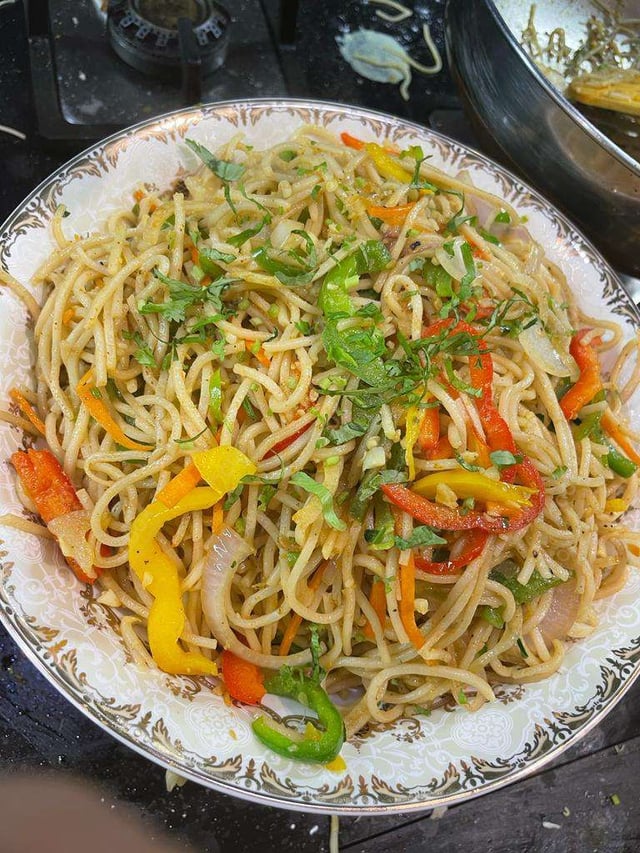 Delicious Veg Hakka Noodles prepared by COOX