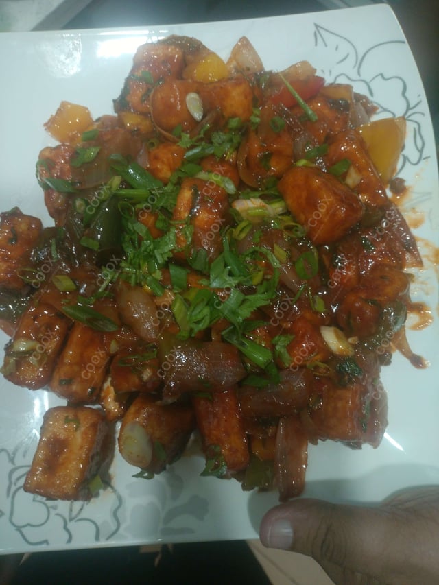 Delicious Chilli Paneer (Dry) prepared by COOX