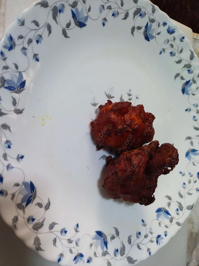 Delicious Chicken Lollipop prepared by COOX