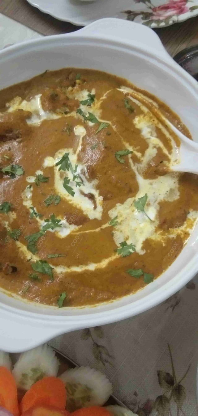 Delicious Malai Kofta (Orange Gravy) prepared by COOX