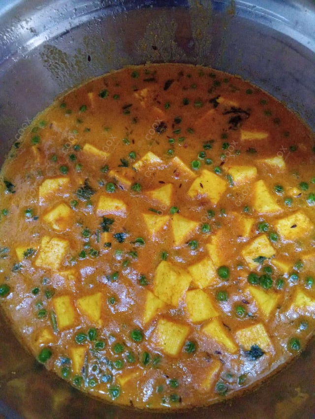 Delicious Matar Paneer prepared by COOX