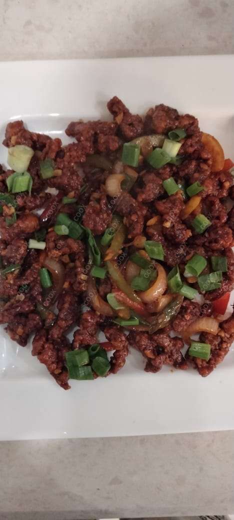 Delicious Crispy Chilli Lamb prepared by COOX