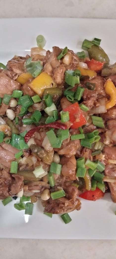 Delicious Kung Pao Chicken prepared by COOX