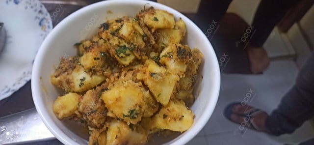 Delicious Jeera Aloo prepared by COOX