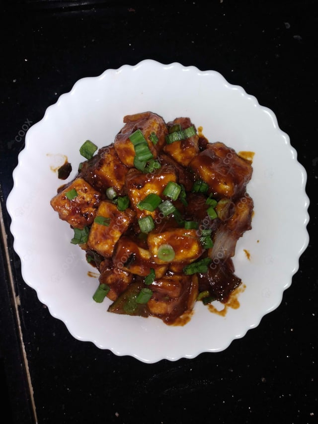 Delicious Chilli Paneer (Dry) prepared by COOX