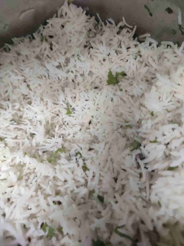 Delicious Jeera Rice prepared by COOX