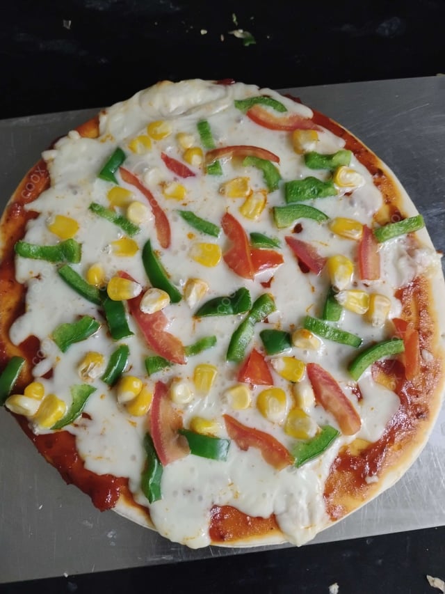 Delicious Margherita Pizza prepared by COOX