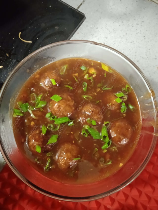 Delicious Veg Manchurian (Gravy) prepared by COOX