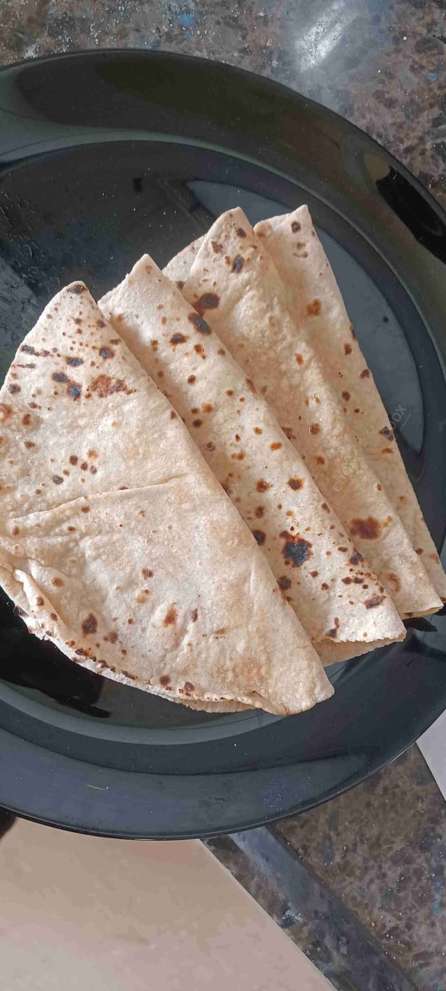 Delicious Tawa Rotis prepared by COOX