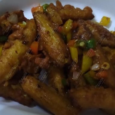 Delicious Crispy Chilly Baby Corn prepared by COOX