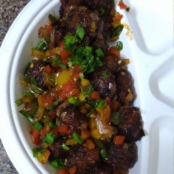 Delicious Veg Manchurian (Dry) prepared by COOX