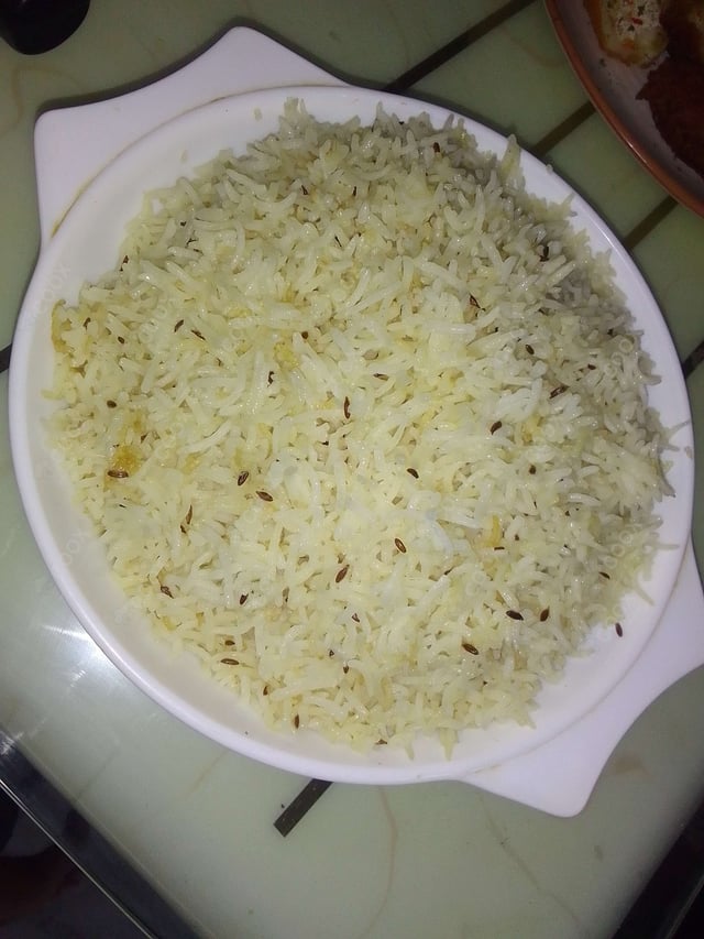 Delicious Jeera Rice prepared by COOX