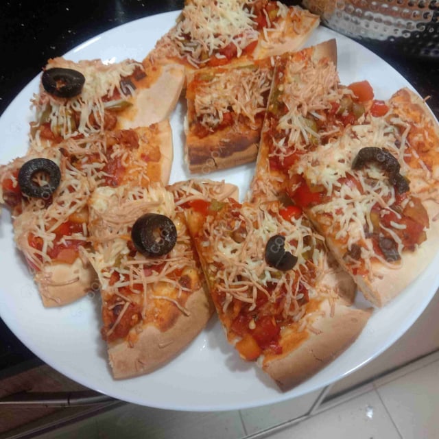 Delicious Chicken Pizza prepared by COOX