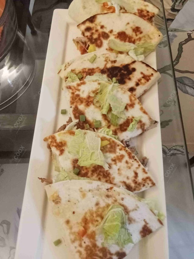 Delicious Chicken Quesadillas prepared by COOX