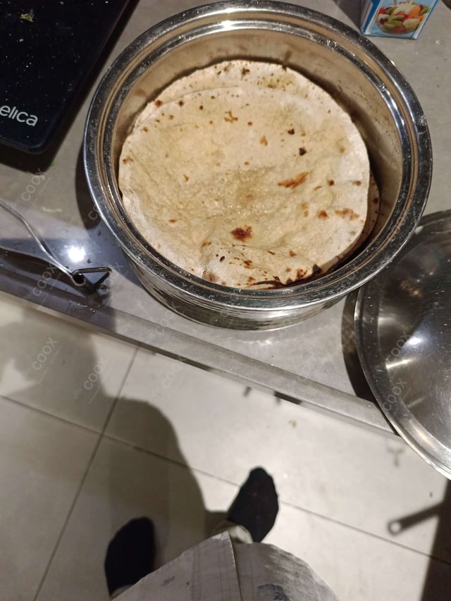 Delicious Tawa Rotis prepared by COOX