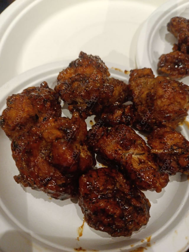 Delicious Chicken Lollipop prepared by COOX