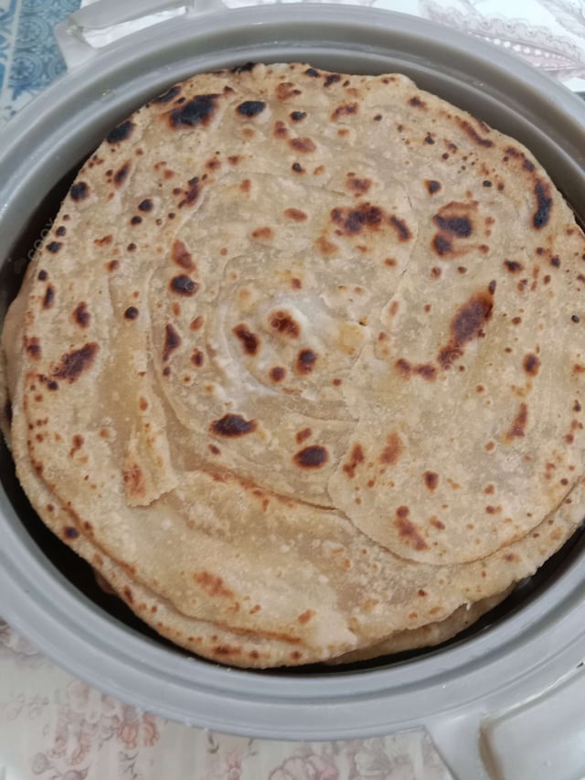 Delicious Lachha Parathas prepared by COOX